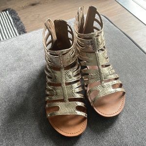 Metallic gold gladiator sandals